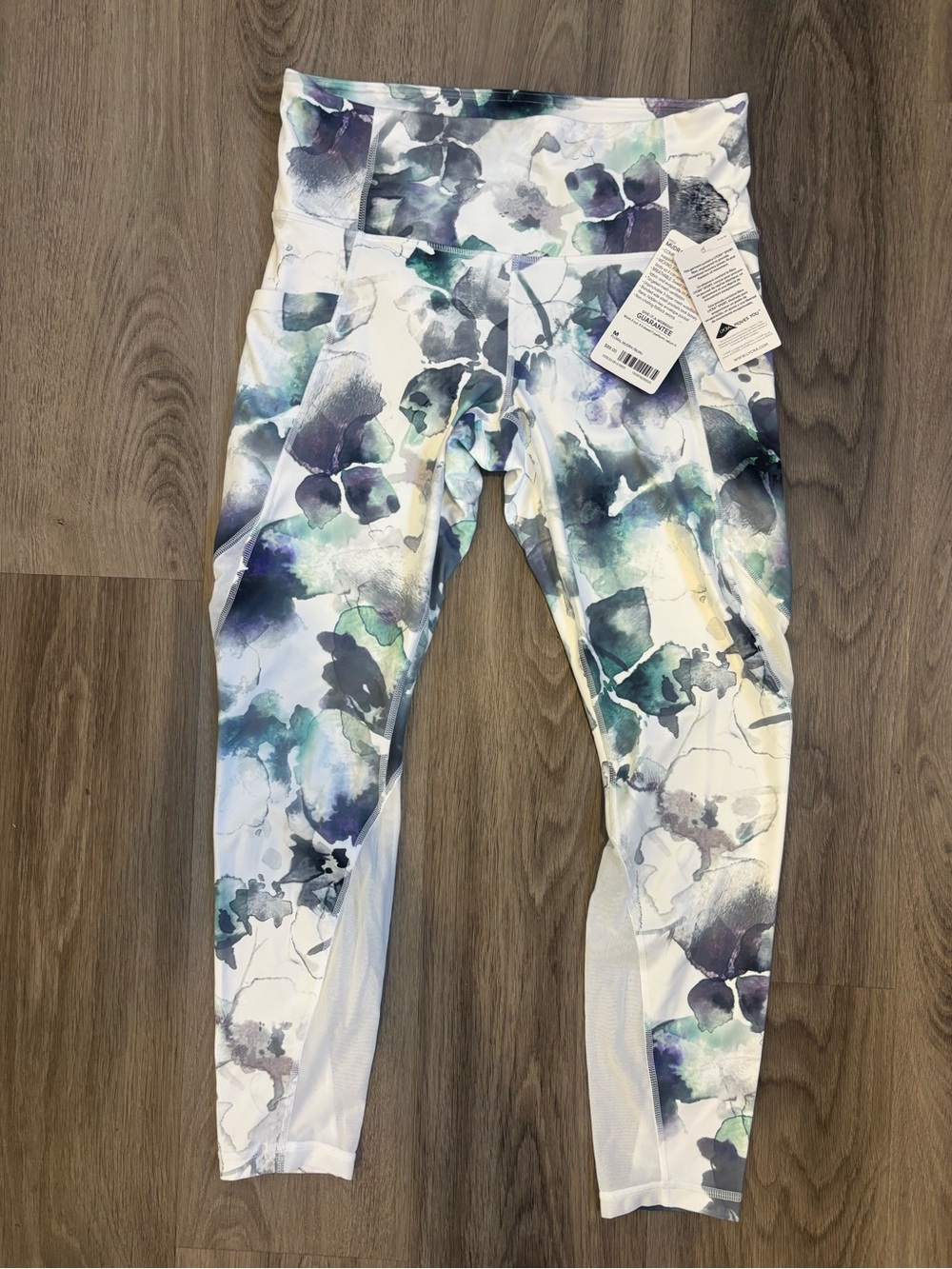 NWT Athleta mudra 7/8 tight new with tags, medium color white floral